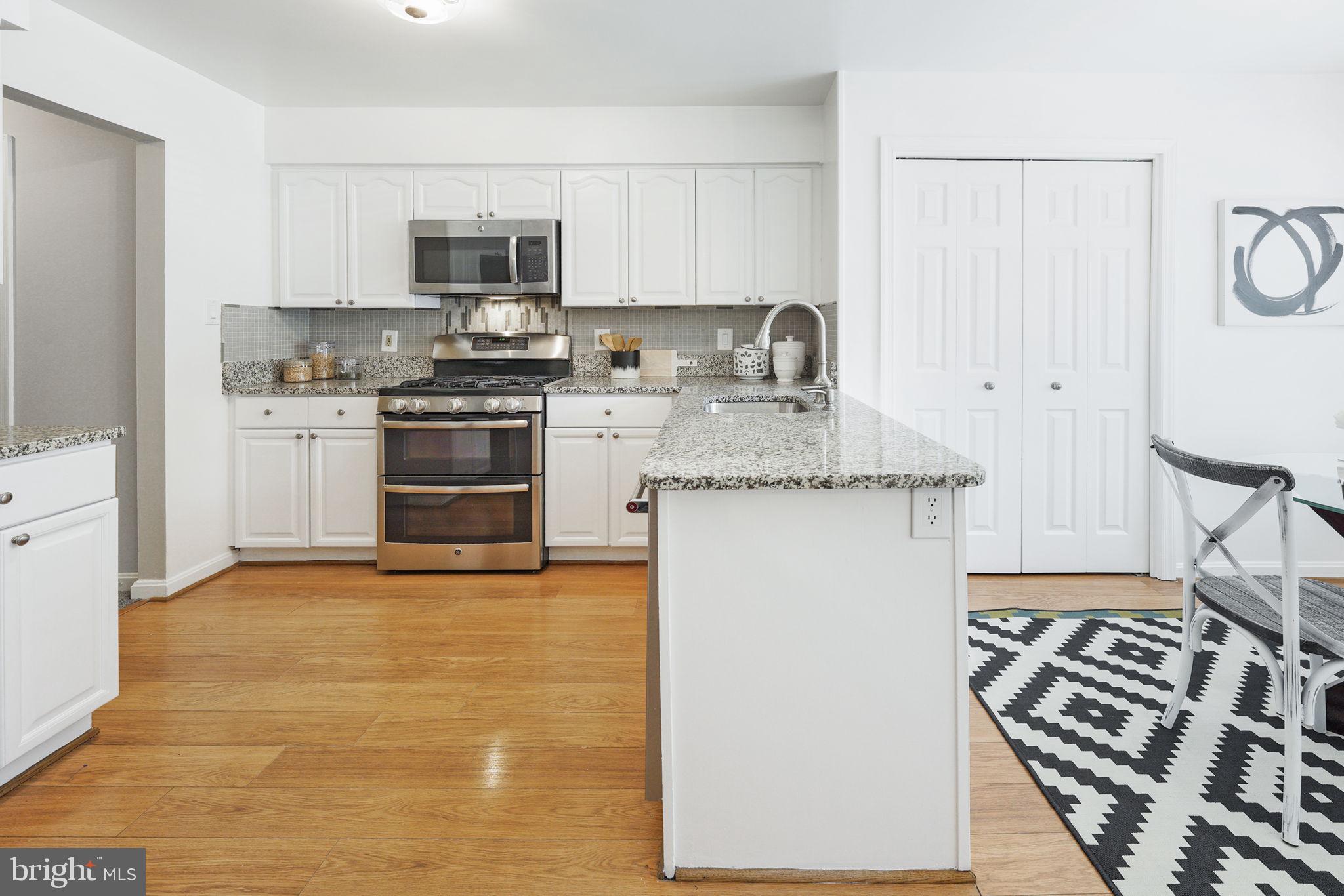 7210 Olde Lantern Way Springfield, VA 22152 - Photo 25 of 52 New Paint in Eat-in Kitchen w/ Granite Countertop