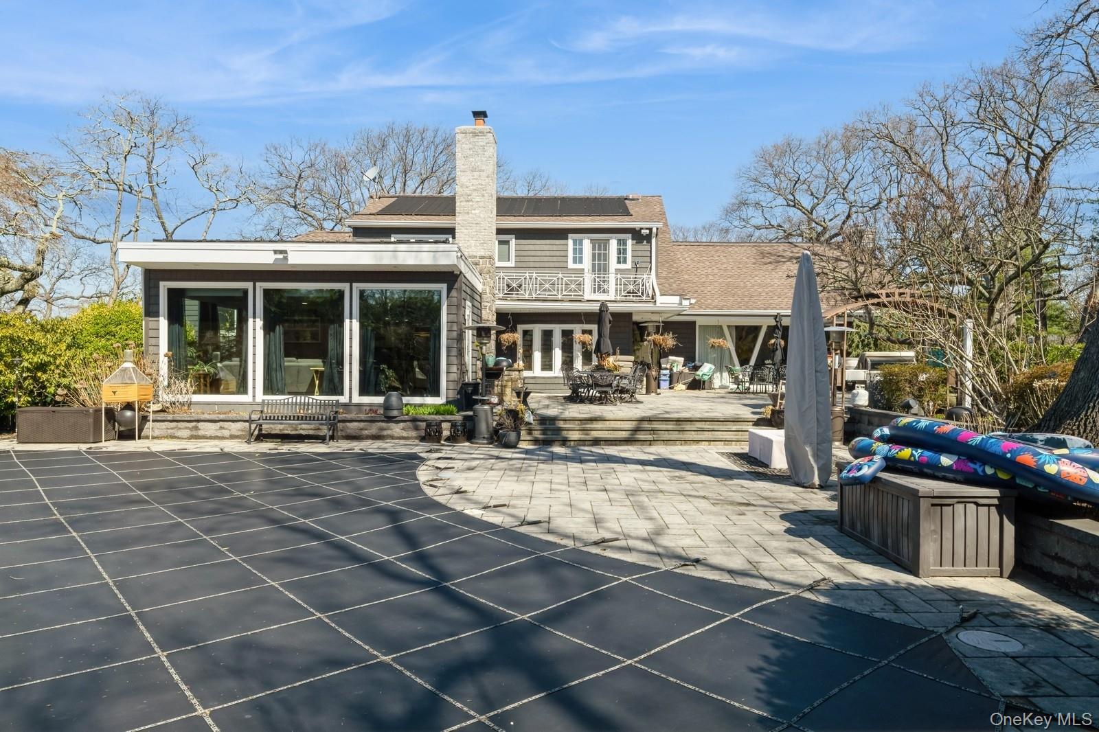 123 Barrett Road Lawrence, NY 11559 - Photo 25 of 32 a view of a building with a outdoor space