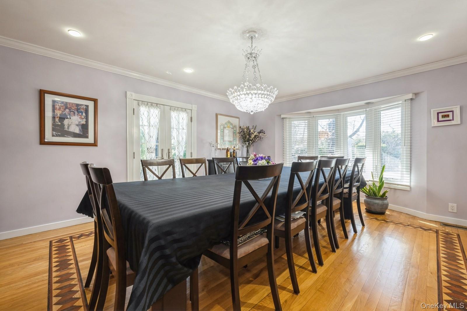 123 Barrett Road Lawrence, NY 11559 - Photo 6 of 32 a view of a dining room with furniture window and wooden floor