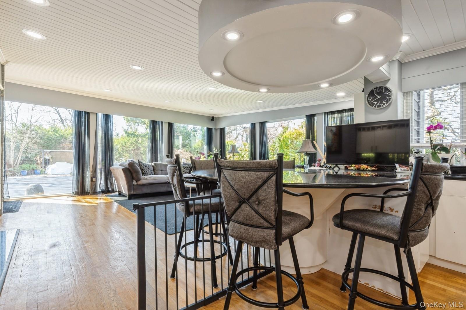 123 Barrett Road Lawrence, NY 11559 - Photo 32 of 32 a view of a dining room with furniture window and outside view