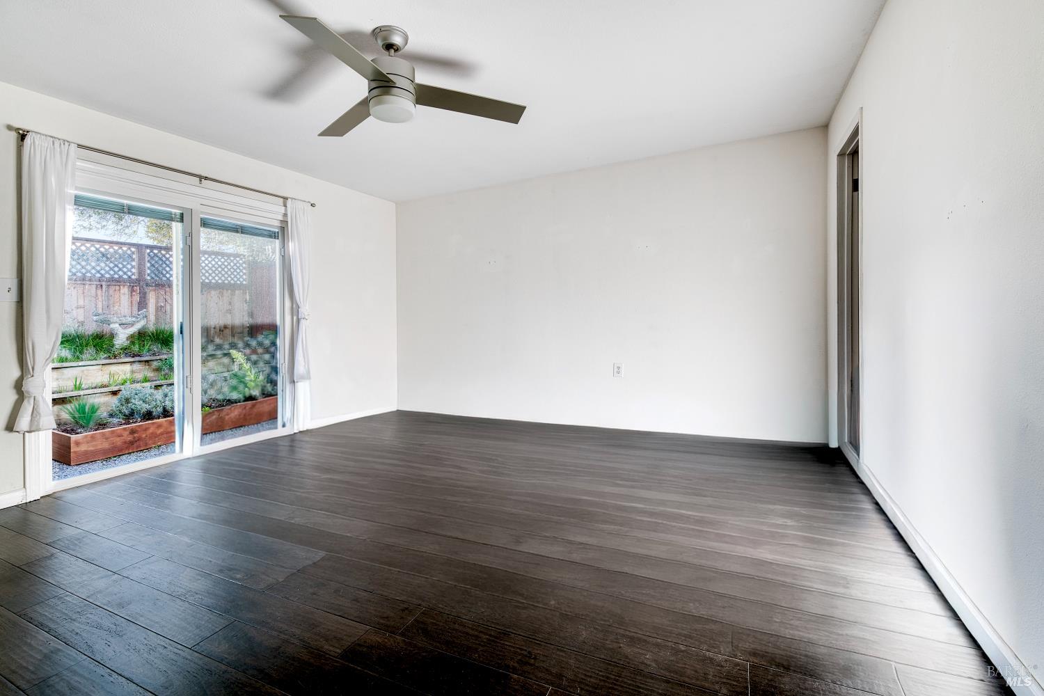 1534 Buchanan Street Novato, CA 94947 - Photo 12 of 30 a view of room with wooden floor and window