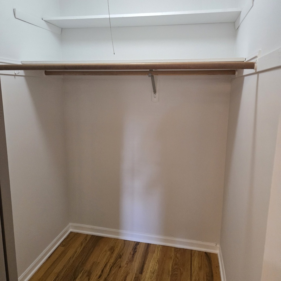 1817 West Touhy Avenue, Unit 2E Park Ridge, IL 60068 - Photo 18 of 19 a view of a room with racks on the wall