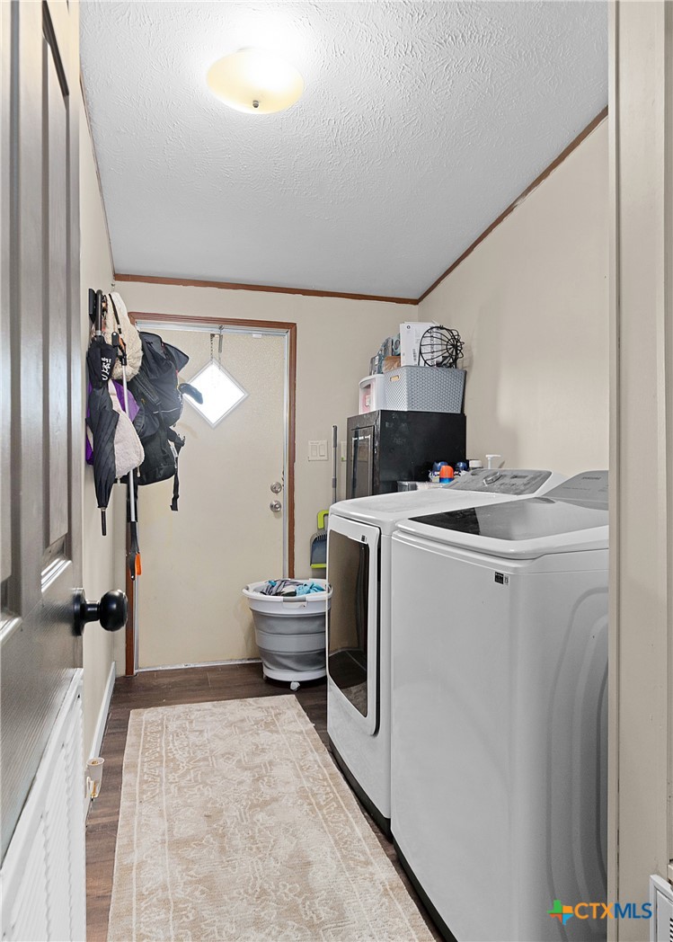 2850 Woodrow Center Road Kingsbury, TX 78638 - Photo 21 of 33 a room with storage and utility
