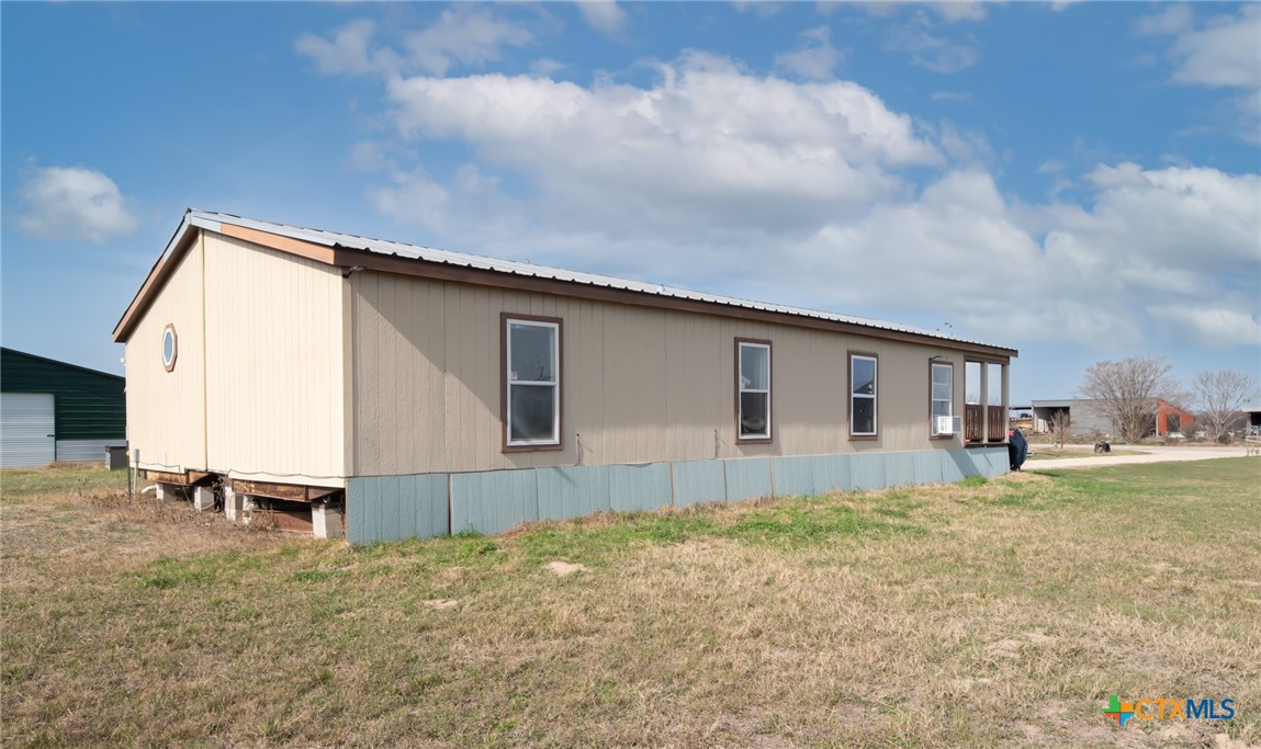 2850 Woodrow Center Road Kingsbury, TX 78638 - Photo 29 of 33 a house view with a backyard space