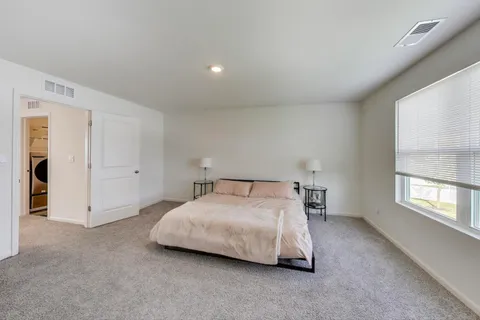 a bathroom with a sink vanity and a mirror