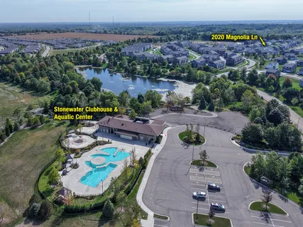 an aerial view of a house and outdoor space