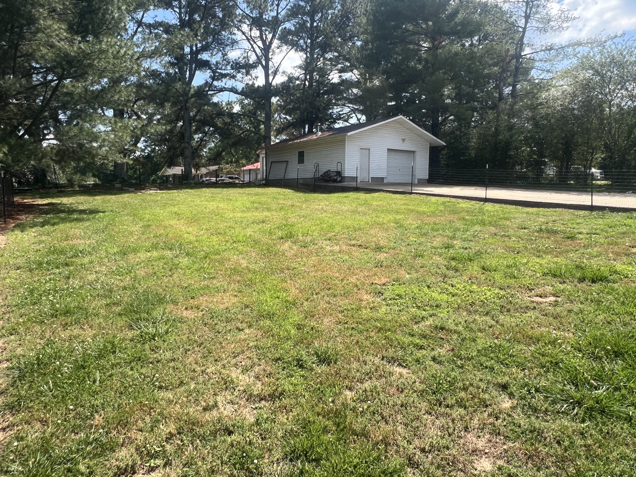 149 Hawthorne Street Pulaski, TN 38478 - Photo 28 of 33 a view of a house with a yard and large trees