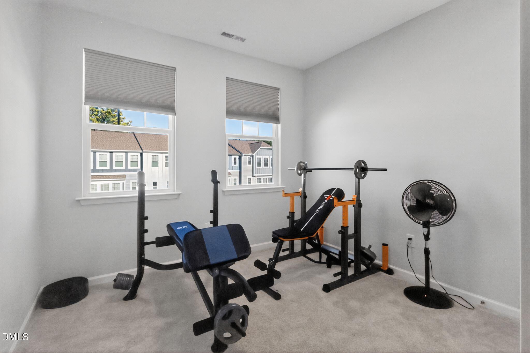1118 Commack Drive Durham, NC 27703 - Photo 21 of 30 a view of a workspace with gym equipment