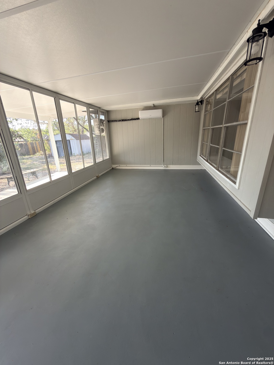 14519 Ridge Meadow Drive San Antonio, TX 78233 - Photo 19 of 25 an empty room with windows