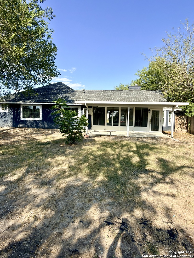 14519 Ridge Meadow Drive San Antonio, TX 78233 - Photo 22 of 25 a front view of a house with a yard