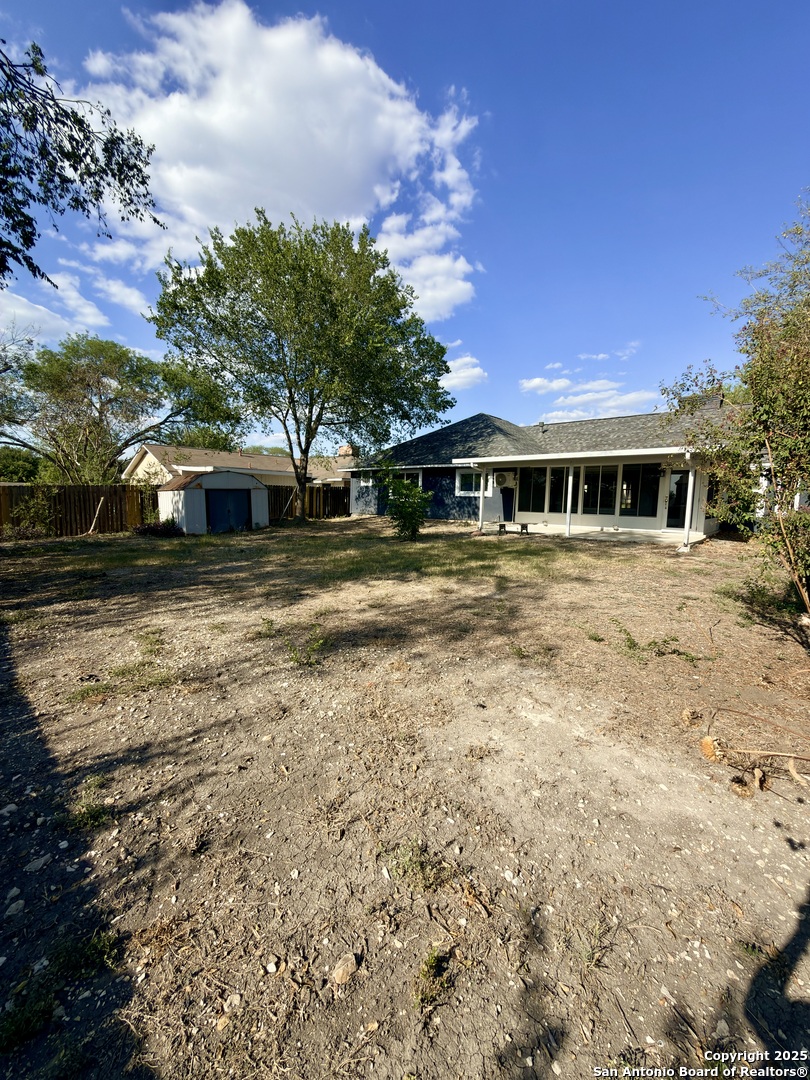 14519 Ridge Meadow Drive San Antonio, TX 78233 - Photo 23 of 25 a view of a house with a yard