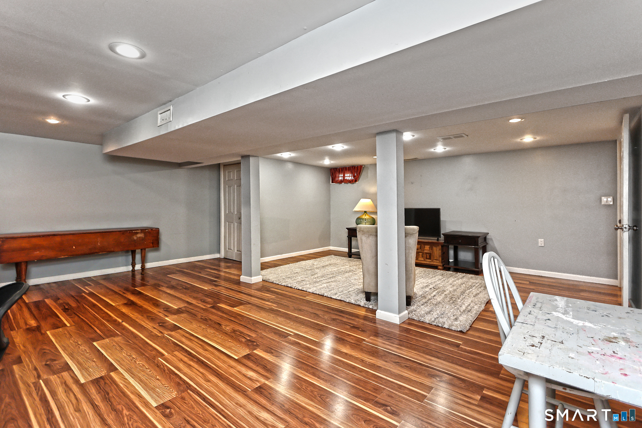 53 Pheasant Road West Haven, CT 06516 - Photo 30 of 39 a view of a room with wooden floor