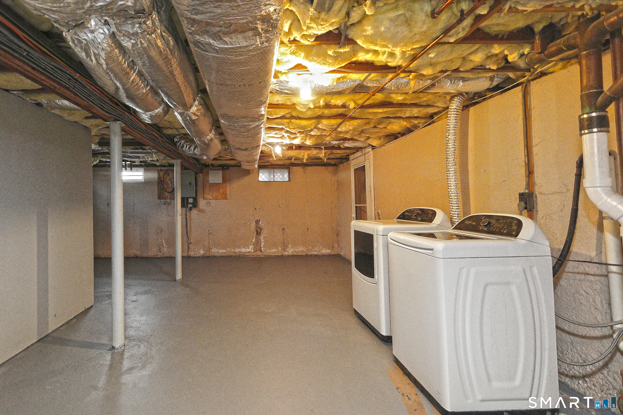 53 Pheasant Road West Haven, CT 06516 - Photo 32 of 39 a view of a storage & utility room with washer and dryer