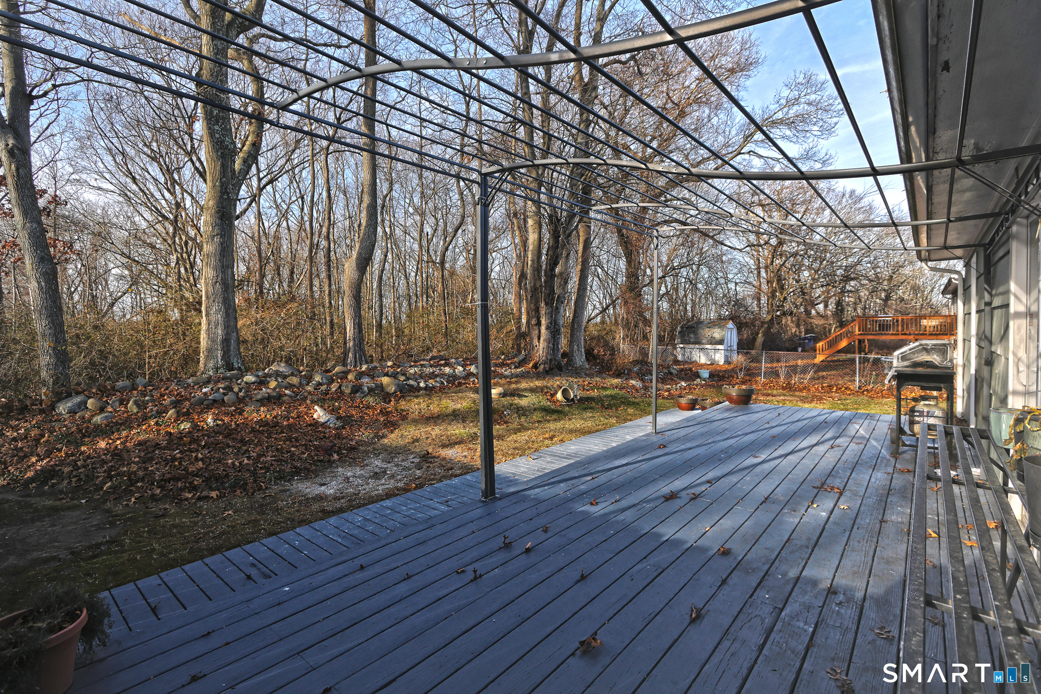 53 Pheasant Road West Haven, CT 06516 - Photo 36 of 39 a view of a swimming pool with a patio