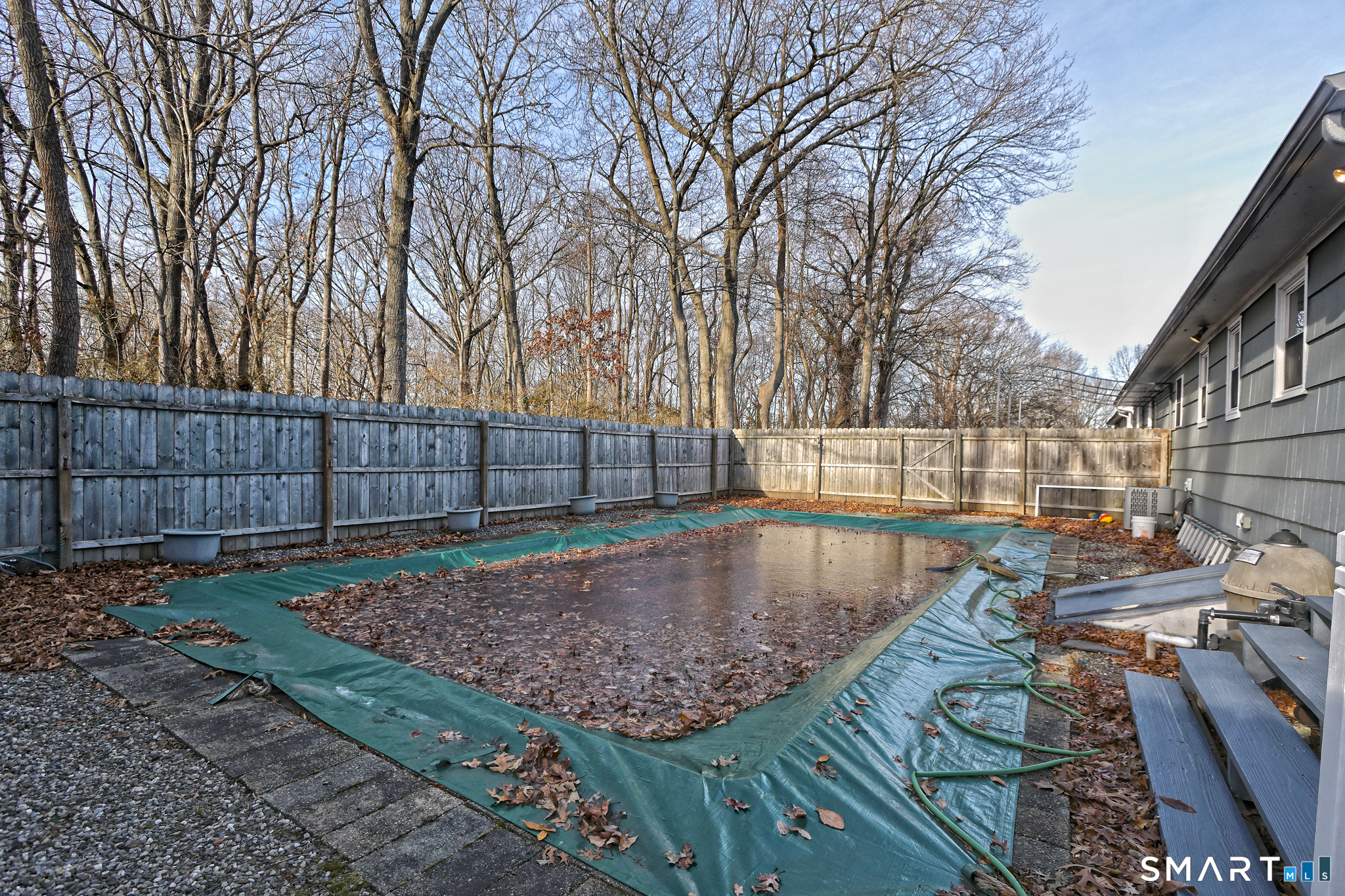 53 Pheasant Road West Haven, CT 06516 - Photo 38 of 39 a view of a backyard with a patio