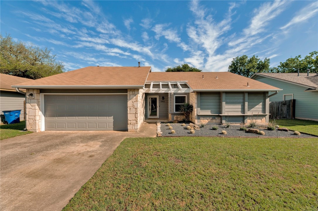 a front view of a house with patio