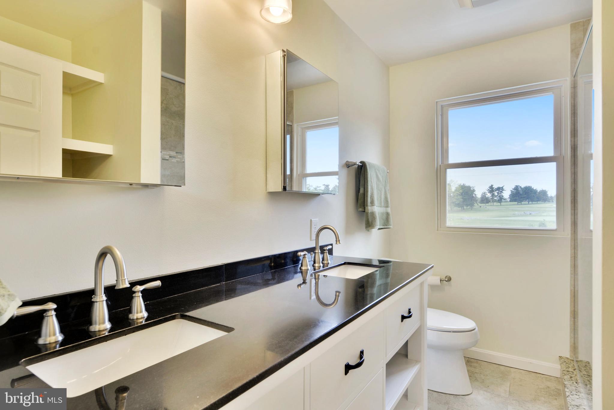 6420 Garnett Drive Chevy Chase, MD 20815 - Photo 14 of 37 New double vanity and more storage in master bath