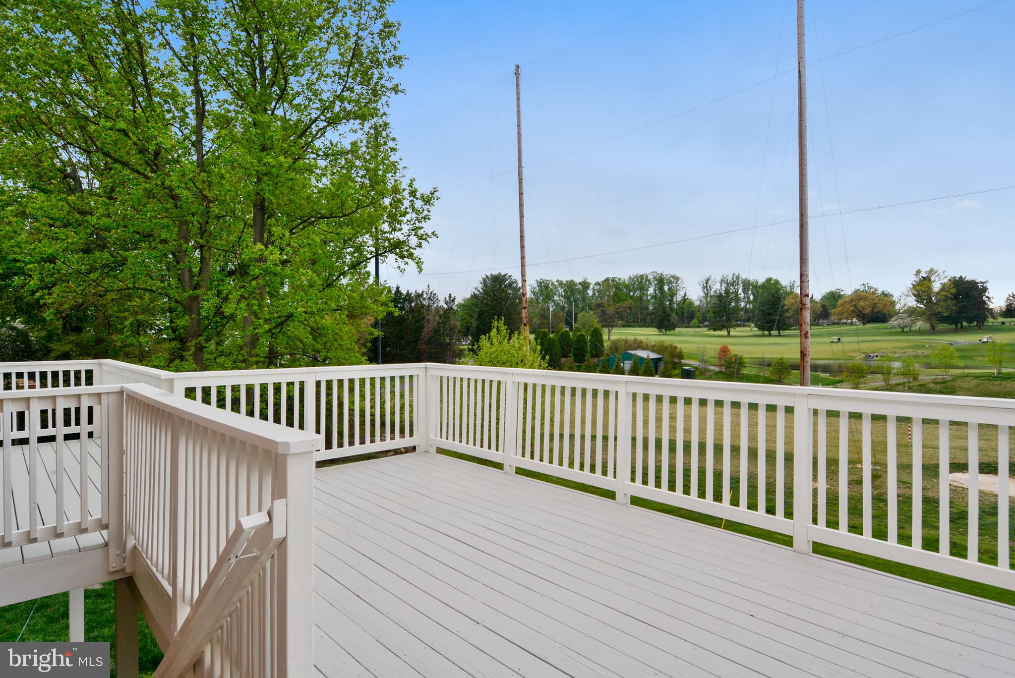 6420 Garnett Drive Chevy Chase, MD 20815 - Photo 22 of 37 Expanded deck to enjoy the views of the course