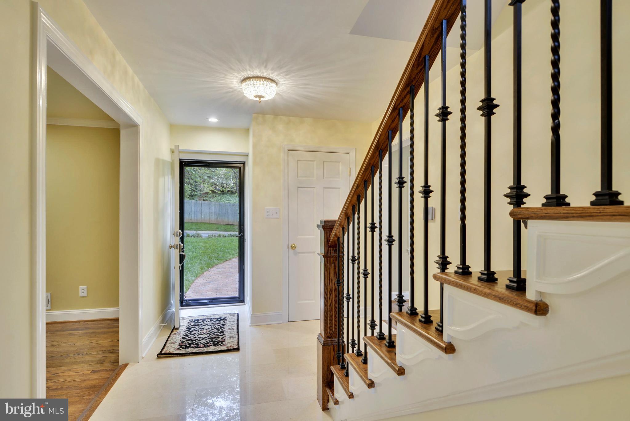 6420 Garnett Drive Chevy Chase, MD 20815 - Photo 3 of 37 Totally rebuilt staircase with marble flooring