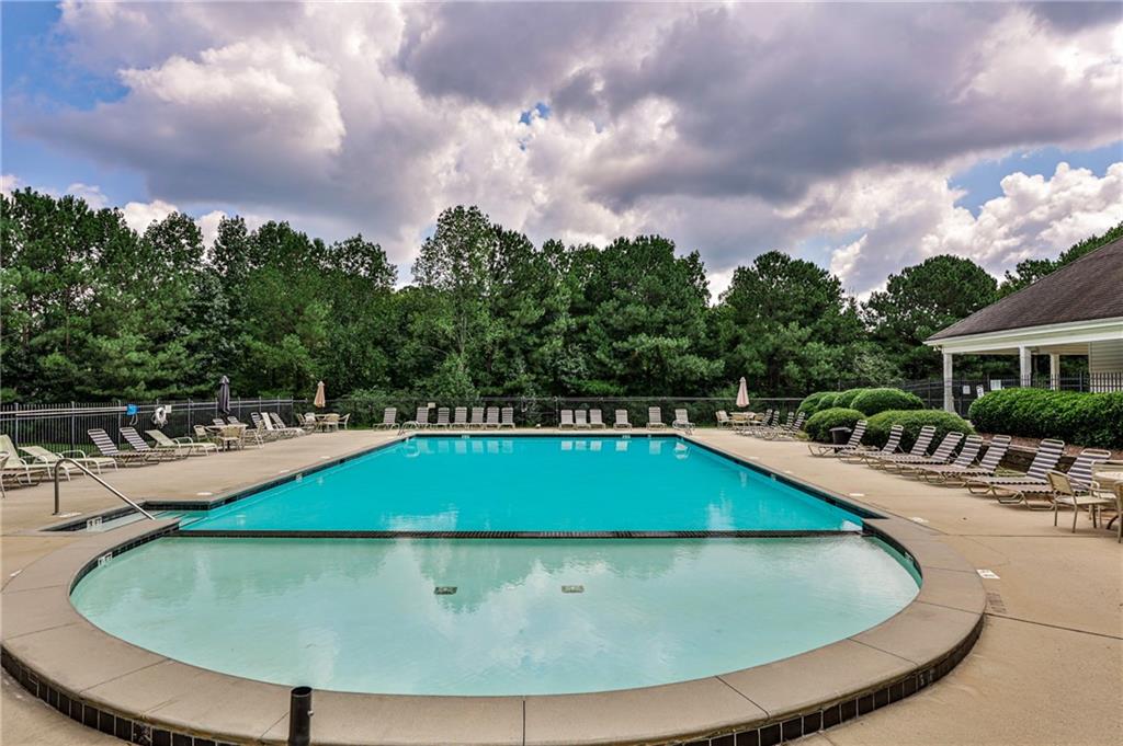 1505 Heatherton Road Dacula, GA 30019 - Photo 29 of 33 a view of swimming pool with seating space