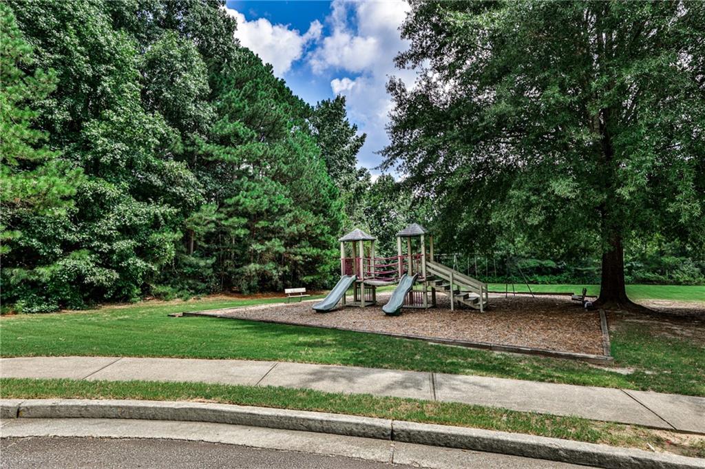 1505 Heatherton Road Dacula, GA 30019 - Photo 30 of 33 a view of a park with large trees