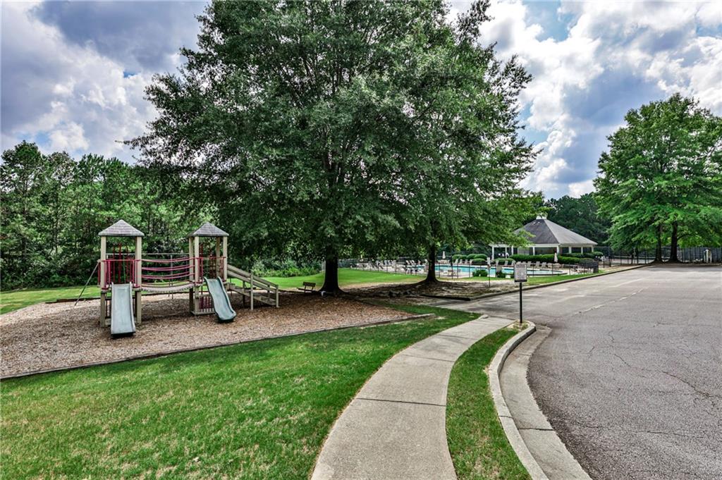 1505 Heatherton Road Dacula, GA 30019 - Photo 31 of 33 a view of a park with slide