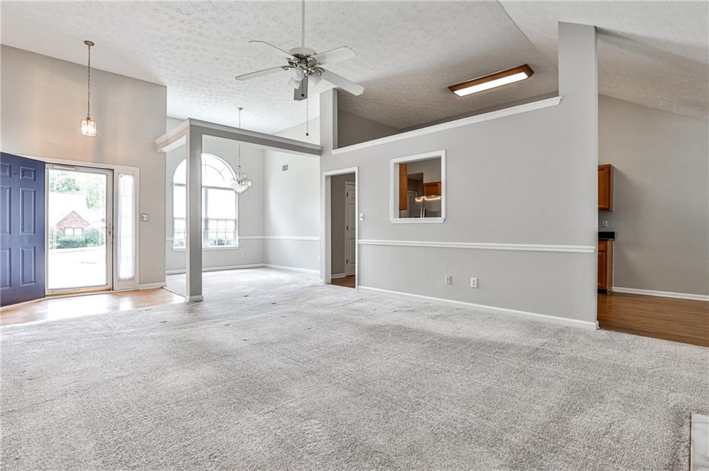 1505 Heatherton Road Dacula, GA 30019 - Photo 5 of 33 a view of an empty room with a window