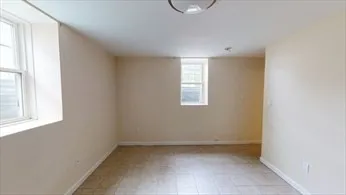an empty room with windows