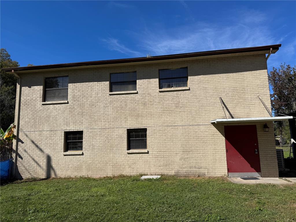 a backyard of a house with lots of green space