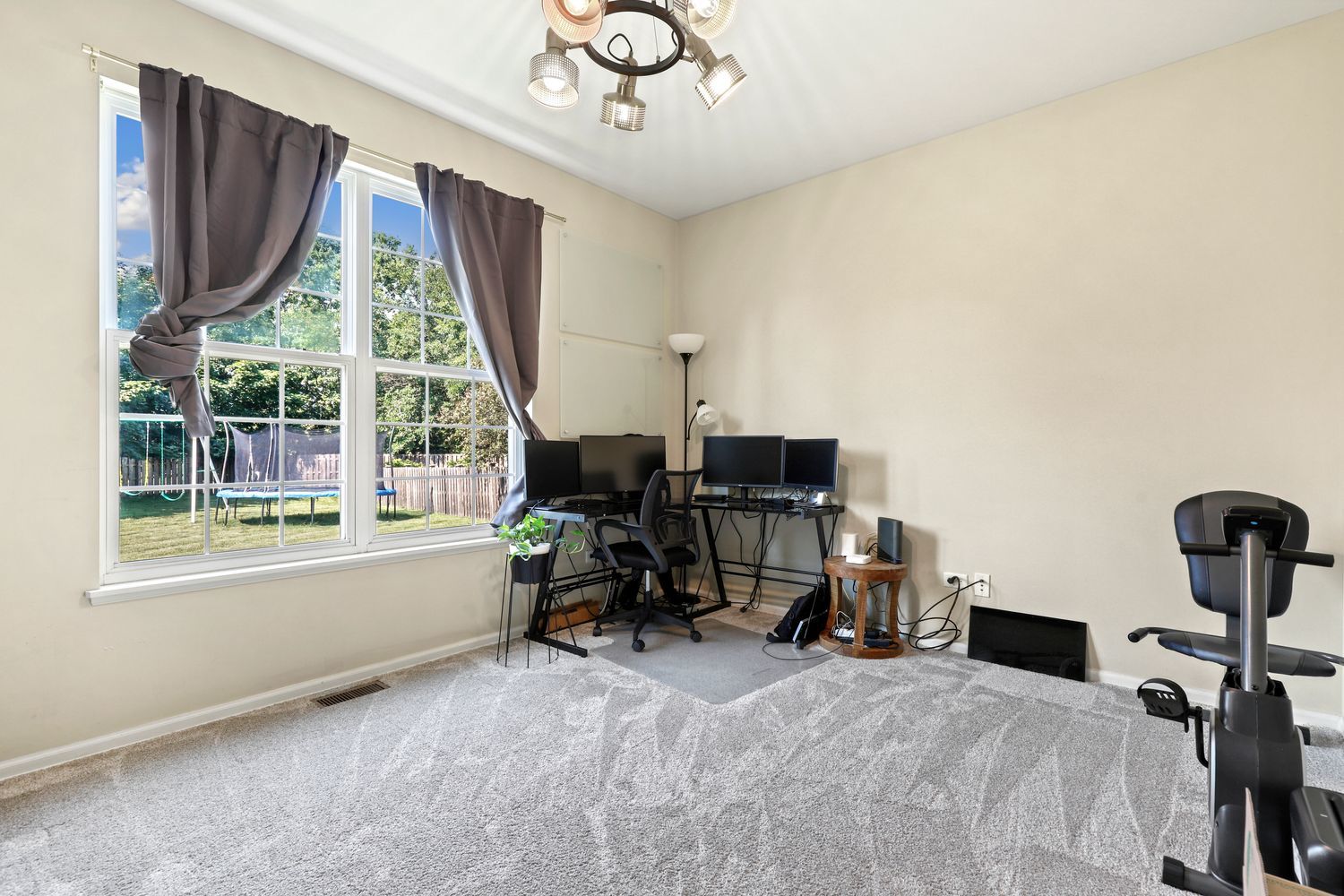 320 Claridge Circle Bolingbrook, IL 60440 - Photo 11 of 27 a view of a workspace with furniture and a window
