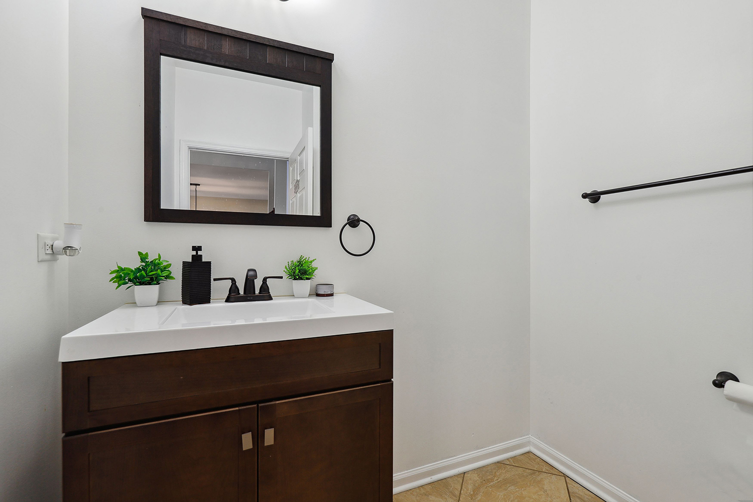 320 Claridge Circle Bolingbrook, IL 60440 - Photo 12 of 27 a bathroom with a sink and a mirror