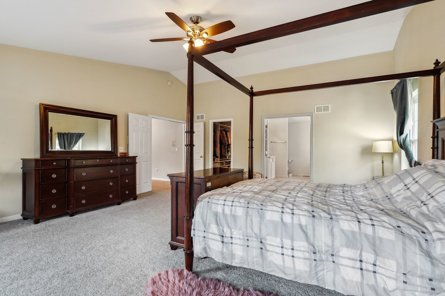 320 Claridge Circle Bolingbrook, IL 60440 - Photo 15 of 27 a bedroom with a bed and a mirror on dresser