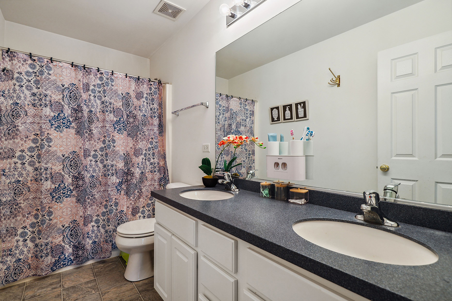 320 Claridge Circle Bolingbrook, IL 60440 - Photo 20 of 27 a bathroom with a granite countertop sink and a mirror