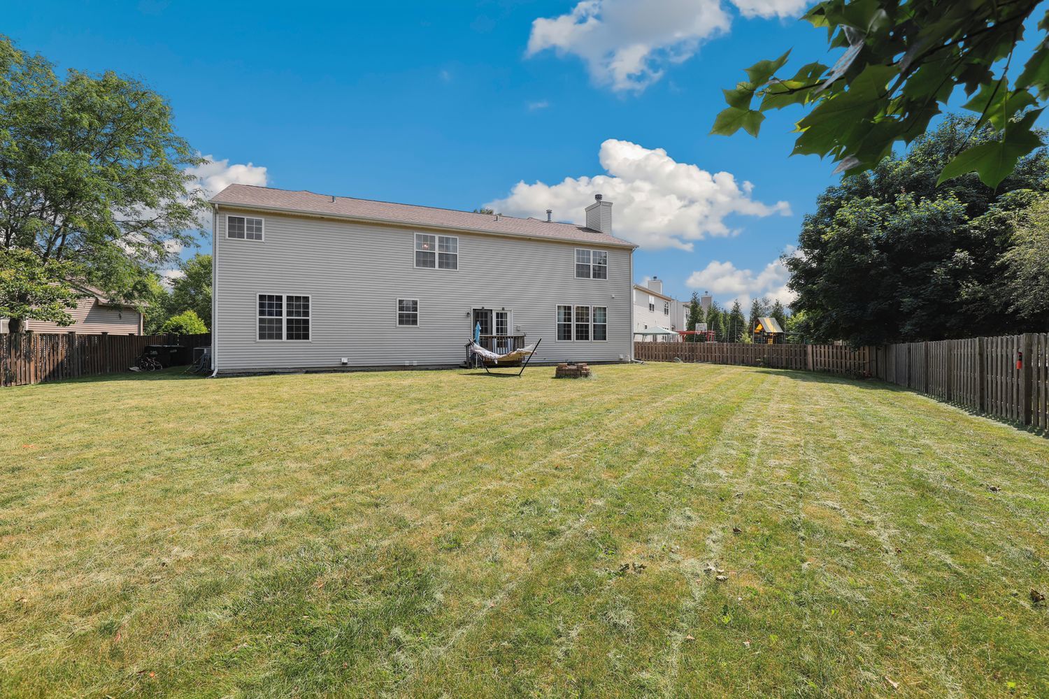320 Claridge Circle Bolingbrook, IL 60440 - Photo 24 of 27 a view of a house with a yard and garage