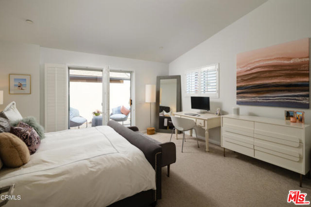 10918 Morrison Street, Unit 12 North Hollywood, CA 91601 - Photo 13 of 28 a bedroom with a bed and a window