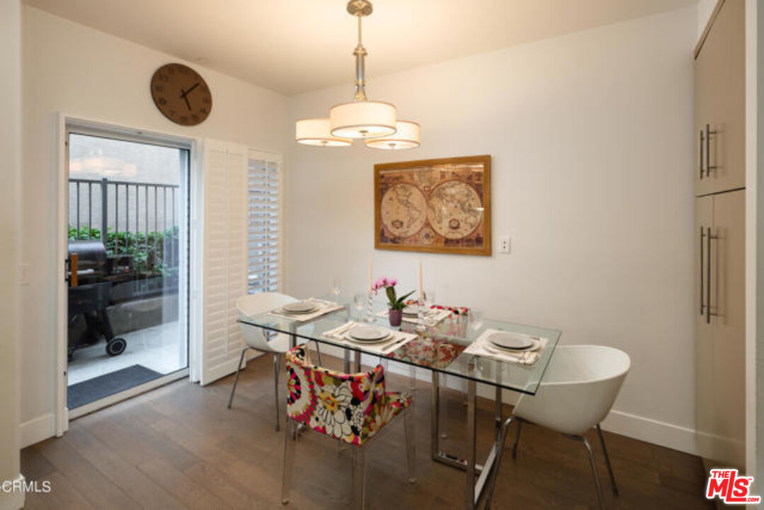 10918 Morrison Street, Unit 12 North Hollywood, CA 91601 - Photo 8 of 28 a dining room with furniture and window