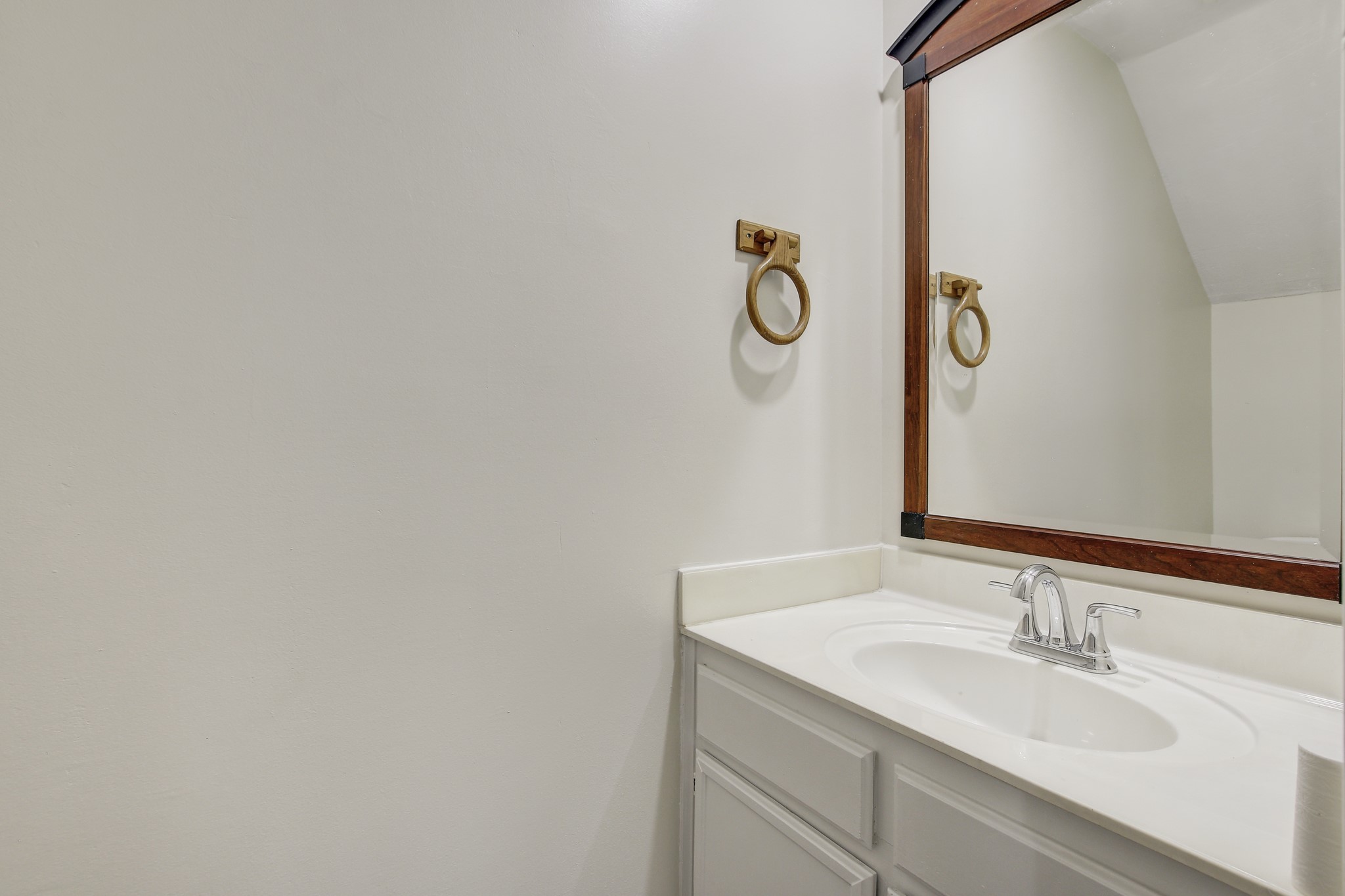 6902 Rifle Bend Austin, TX 78736 - Photo 17 of 33 a bathroom with a granite countertop sink and a mirror