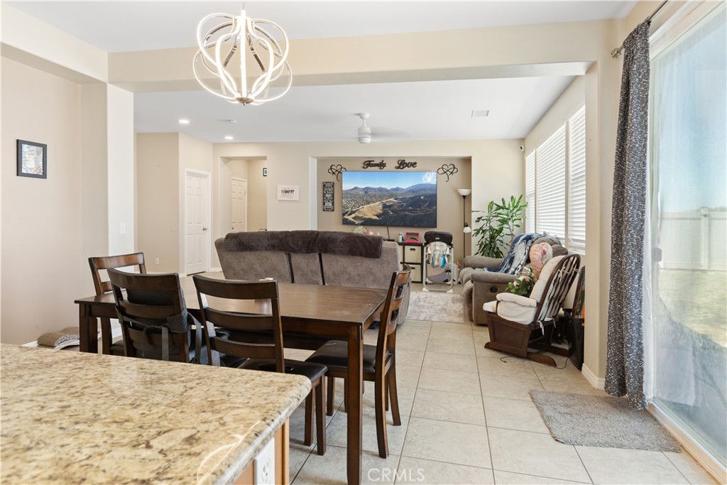 11643 Raptor Lane Desert Hot Springs, CA 92240 - Photo 11 of 37 a view of a dining room with furniture