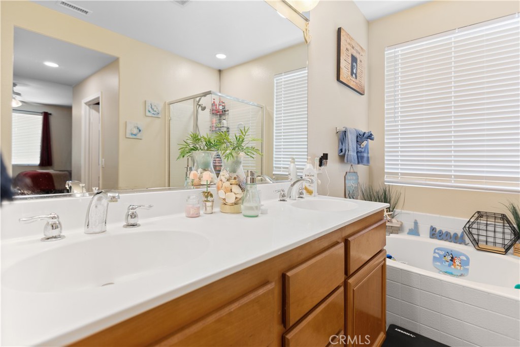 11643 Raptor Lane Desert Hot Springs, CA 92240 - Photo 21 of 37 a bathroom with a sink and a mirror