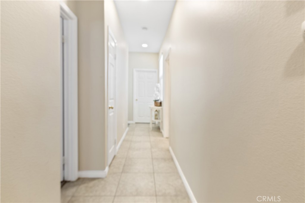 11643 Raptor Lane Desert Hot Springs, CA 92240 - Photo 30 of 37 a view of a hallway