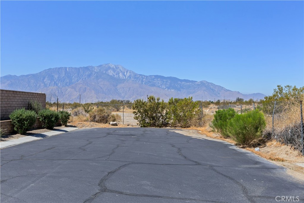 11643 Raptor Lane Desert Hot Springs, CA 92240 - Photo 34 of 37 a view of an outdoor space and mountain view