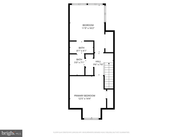 a picture of a bench in front of a building