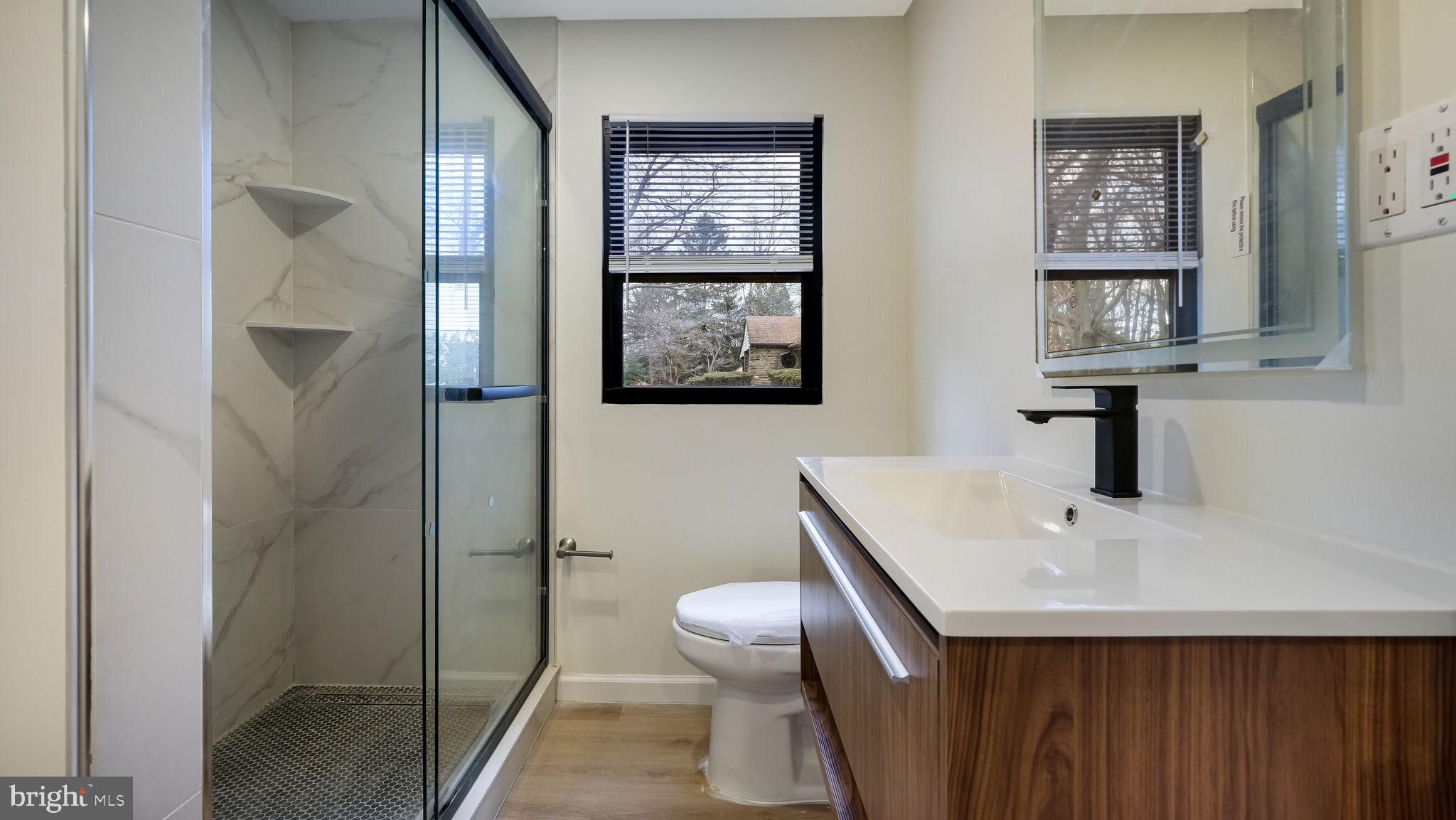 1617 Church Road Wyncote, PA 19095 - Photo 23 of 39 Modern bathroom with sleek design.