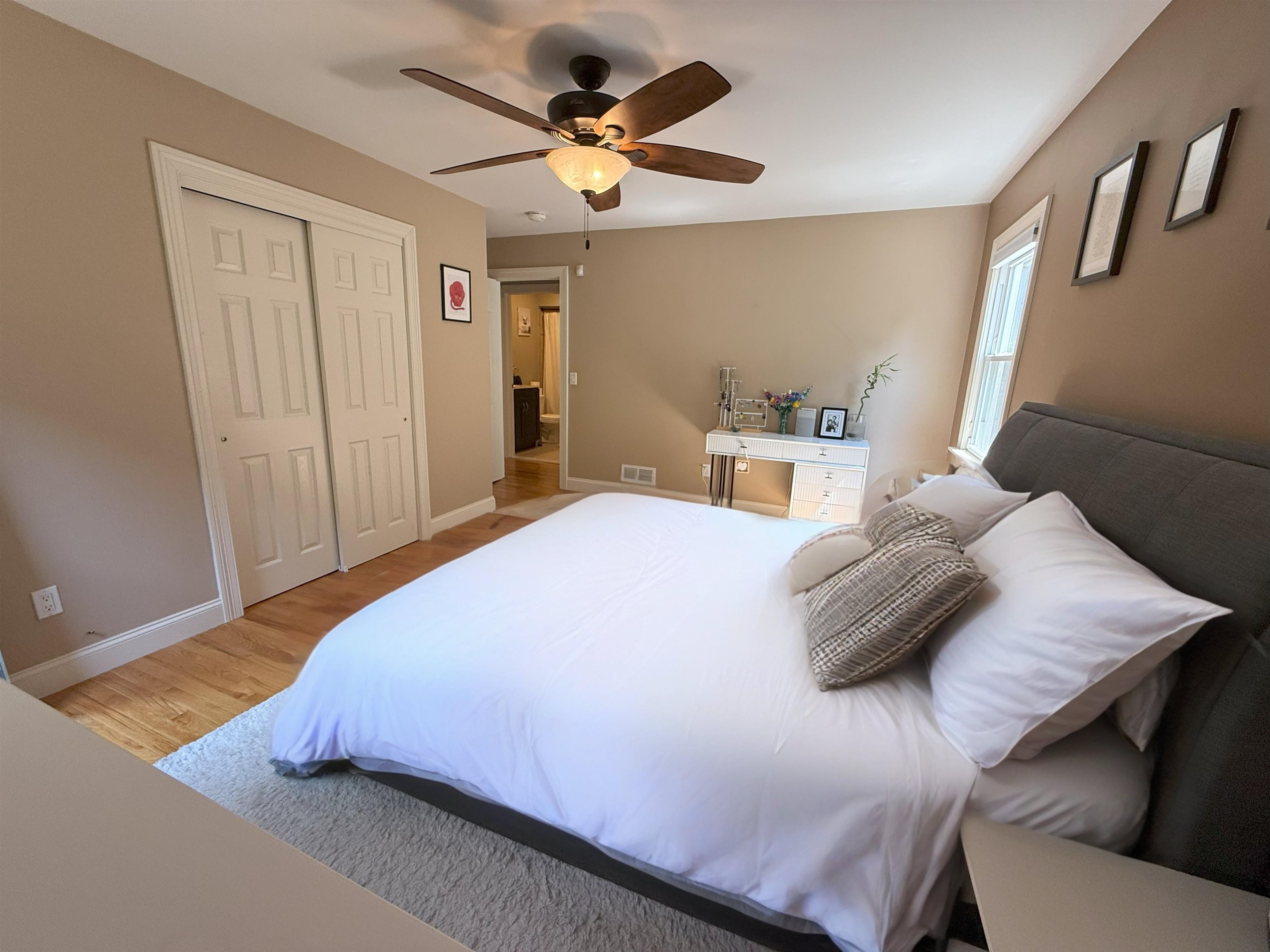 45 Garfield Place, Unit 1 (1ST FLOOR) Ridgewood, NJ 07450 - Photo 13 of 33 a bedroom with a bed and a ceiling fan