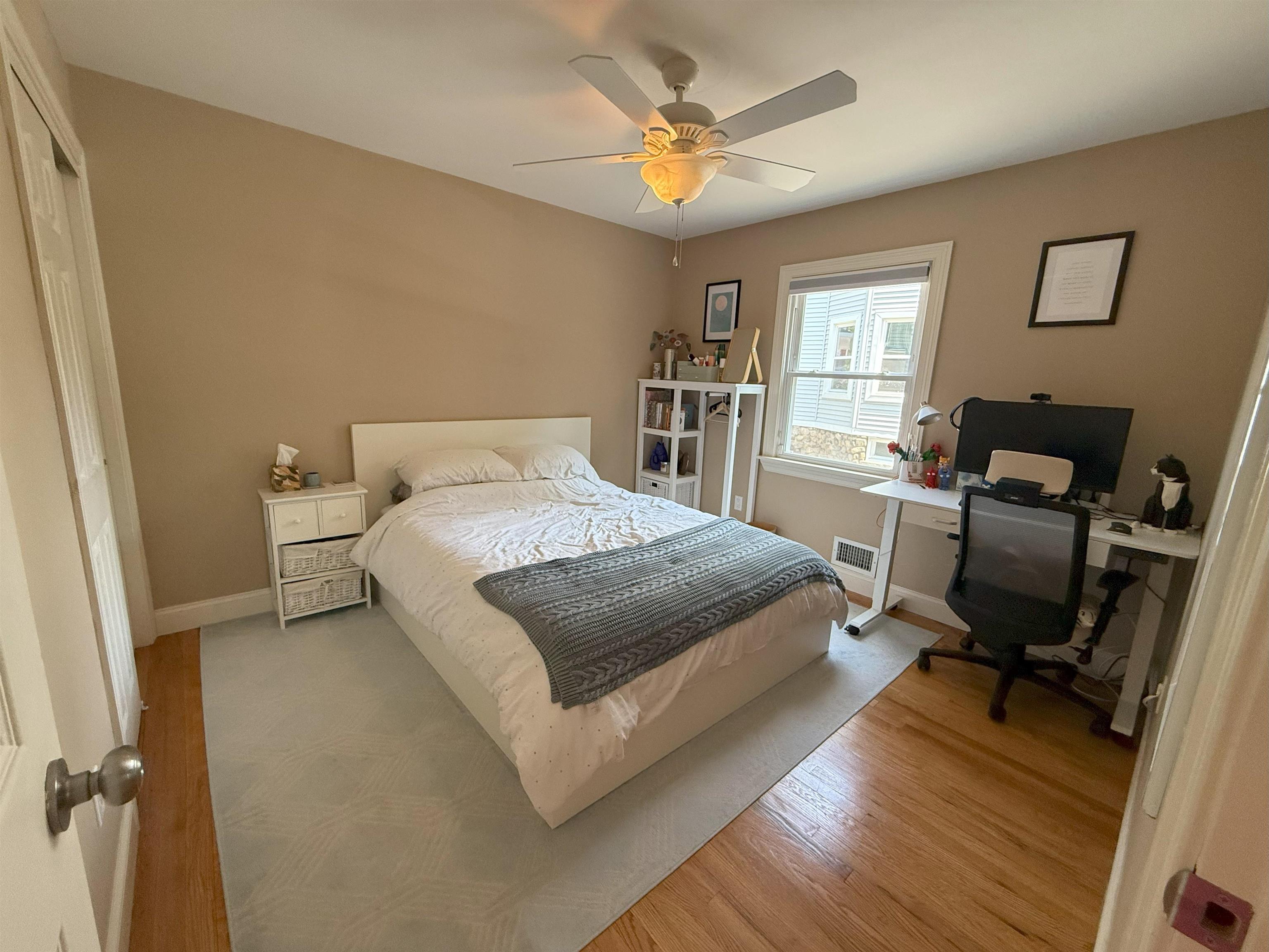 45 Garfield Place, Unit 1 (1ST FLOOR) Ridgewood, NJ 07450 - Photo 16 of 33 a bedroom with a bed and a window