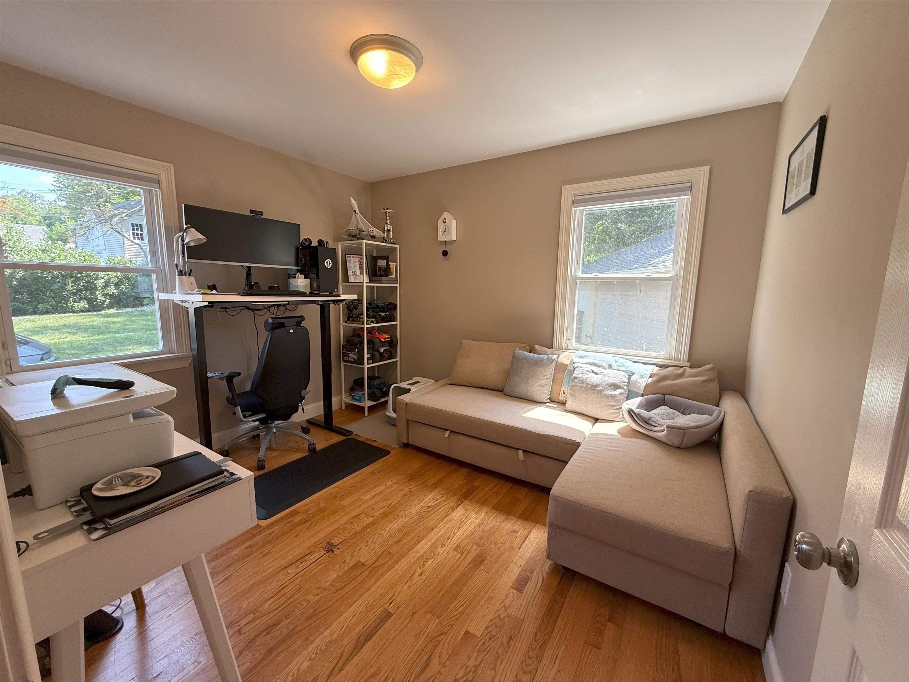 45 Garfield Place, Unit 1 (1ST FLOOR) Ridgewood, NJ 07450 - Photo 19 of 33 a living room with furniture and a flat screen tv