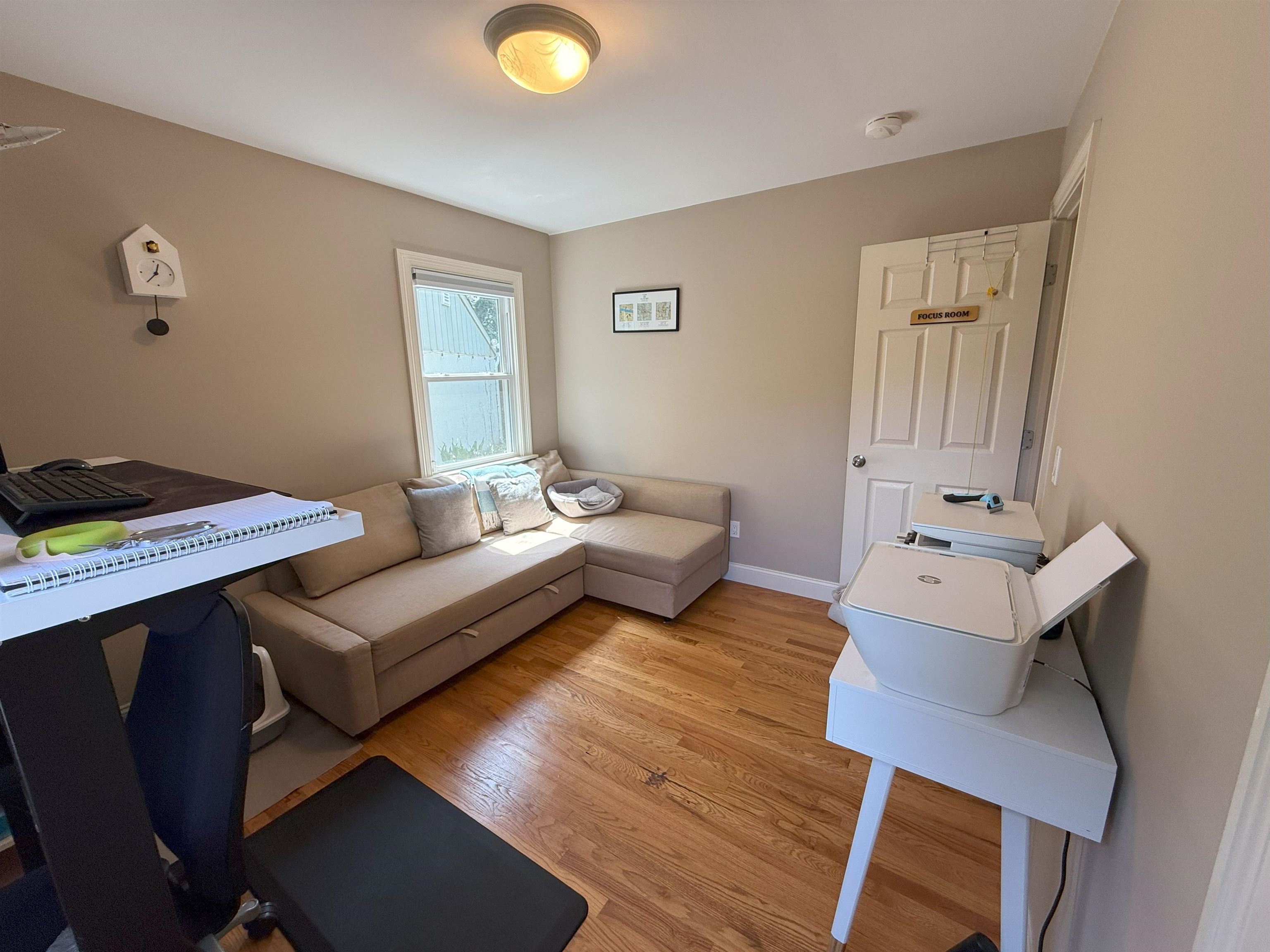 45 Garfield Place, Unit 1 (1ST FLOOR) Ridgewood, NJ 07450 - Photo 20 of 33 a living room with furniture and a table