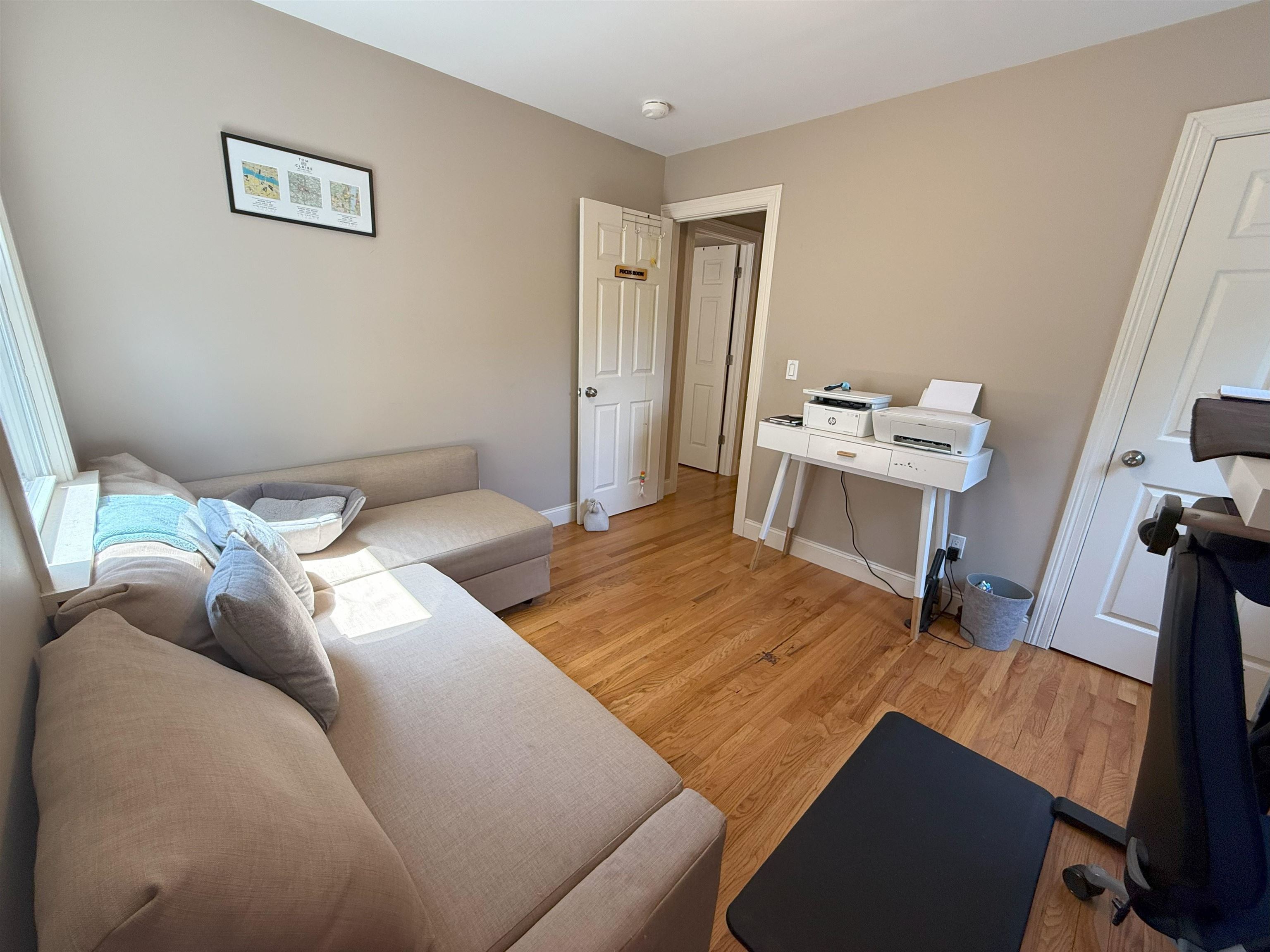 45 Garfield Place, Unit 1 (1ST FLOOR) Ridgewood, NJ 07450 - Photo 21 of 33 a bedroom with a bed and a desk