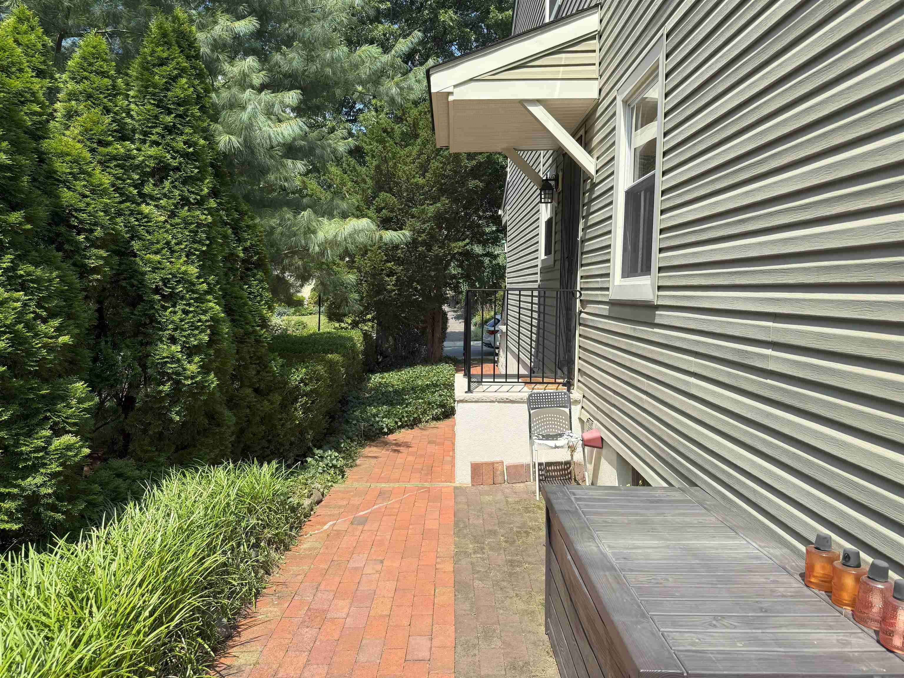 45 Garfield Place, Unit 1 (1ST FLOOR) Ridgewood, NJ 07450 - Photo 29 of 33 a view of backyard with plants and outdoor seating