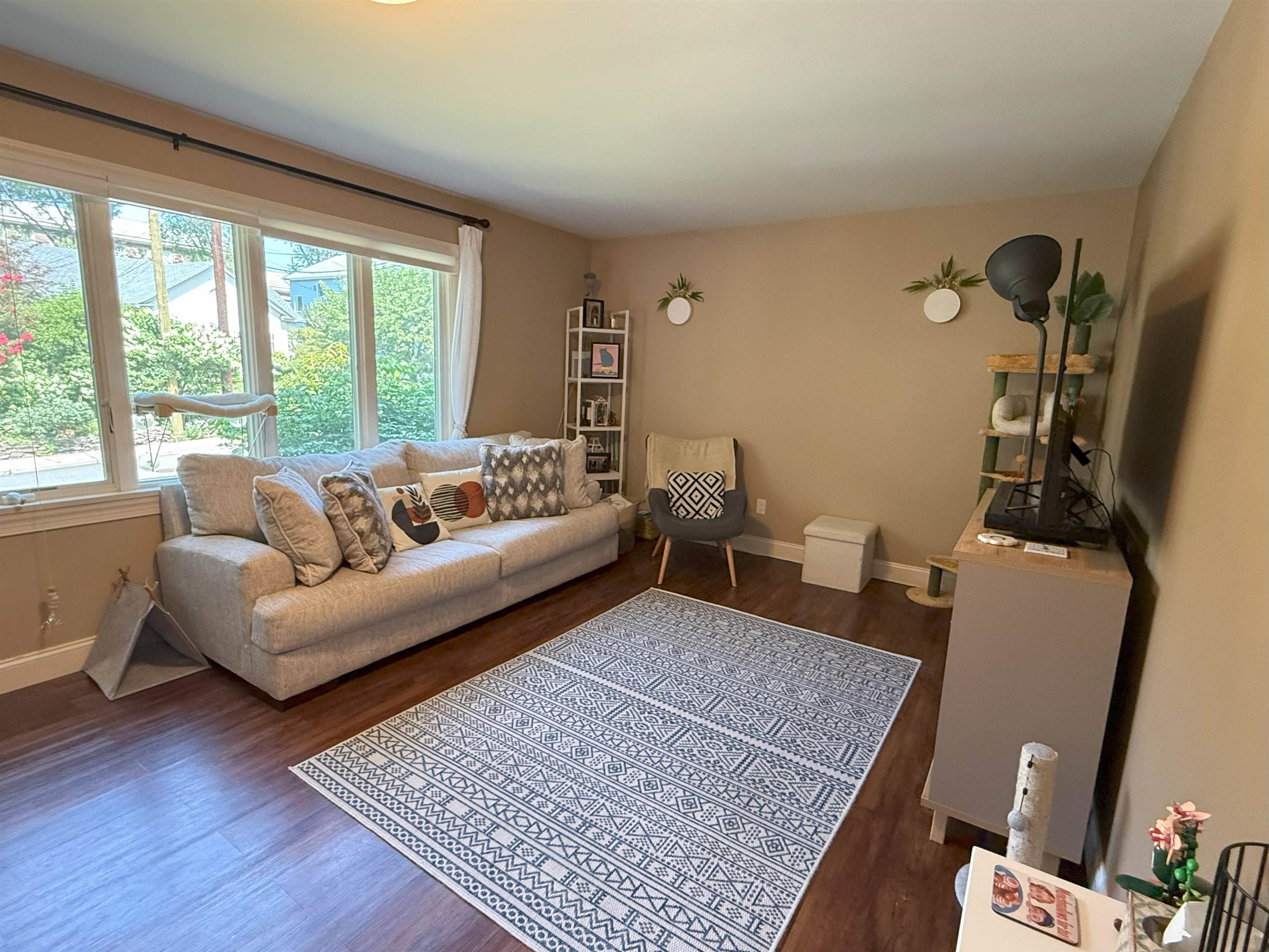 45 Garfield Place, Unit 1 (1ST FLOOR) Ridgewood, NJ 07450 - Photo 4 of 33 a living room with furniture and a window